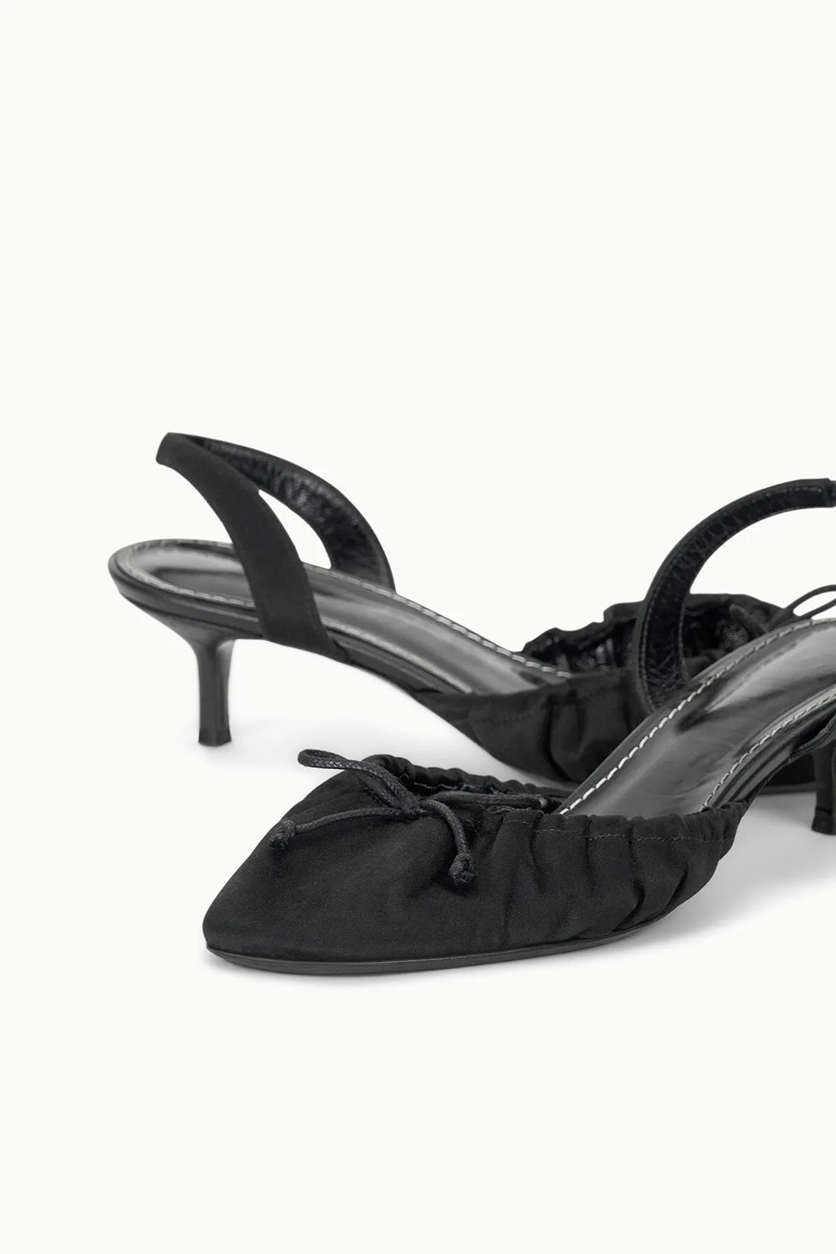 ALBA BALLET SLINGBACK | BLACK SATIN cultural symbol