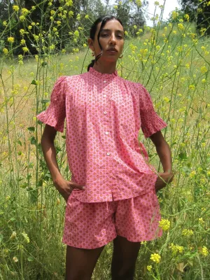Cary Short in Carmine Dot cycling outfit