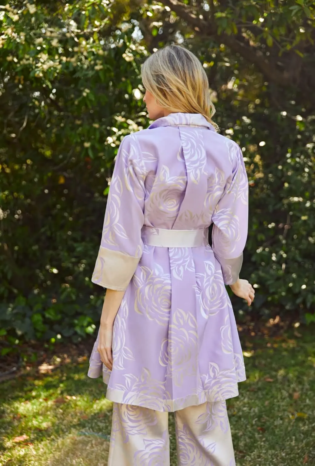 Run for the Roses Belted Swing Coat - Lilac travel edge