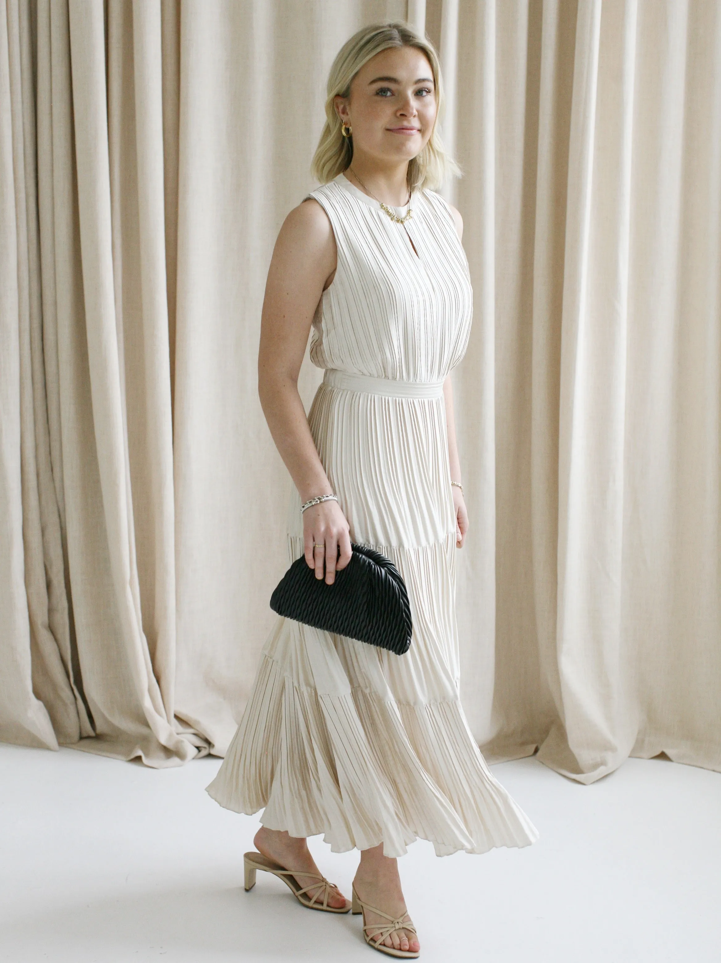 Sleeveless Taupe Pleat Dress seasonal vibe