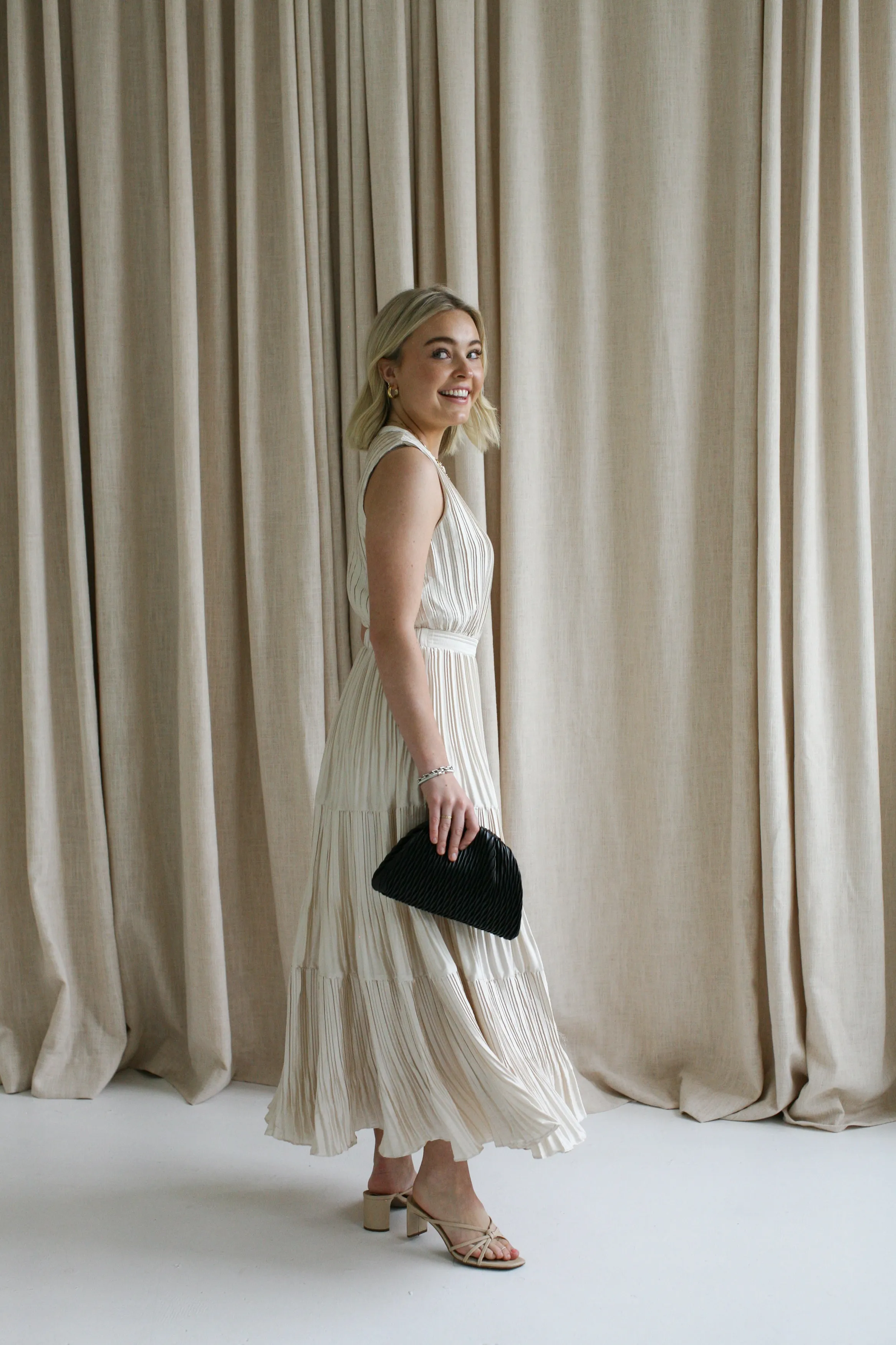 Sleeveless Taupe Pleat Dress flirty style